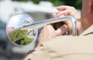 reflectionthroughabugle_by_markcoffey_via_istockphoto
